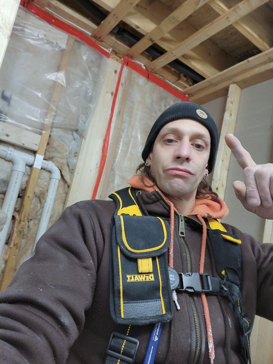 Jose Nieves, owner of Genesis Building Services, on a framing job